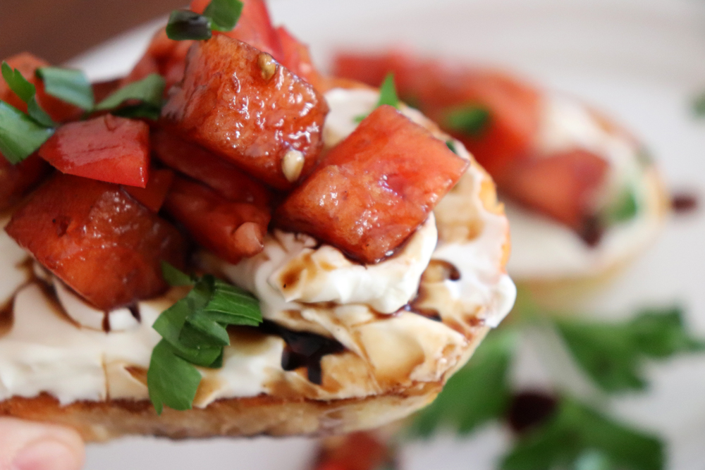 Bite shot of Watermelon Bruschetta with Whipped Cream Cheese