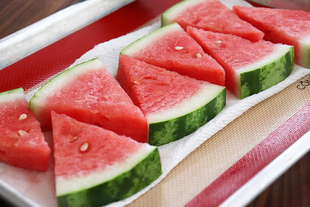 Drain watermelon on paper towels