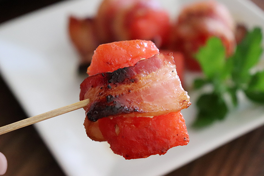 Bite shot of Bacon Wrapped Watermelon